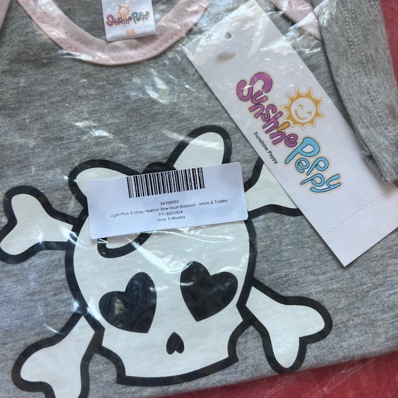 Brand new skull printed onsie. - Picture 3 of 3